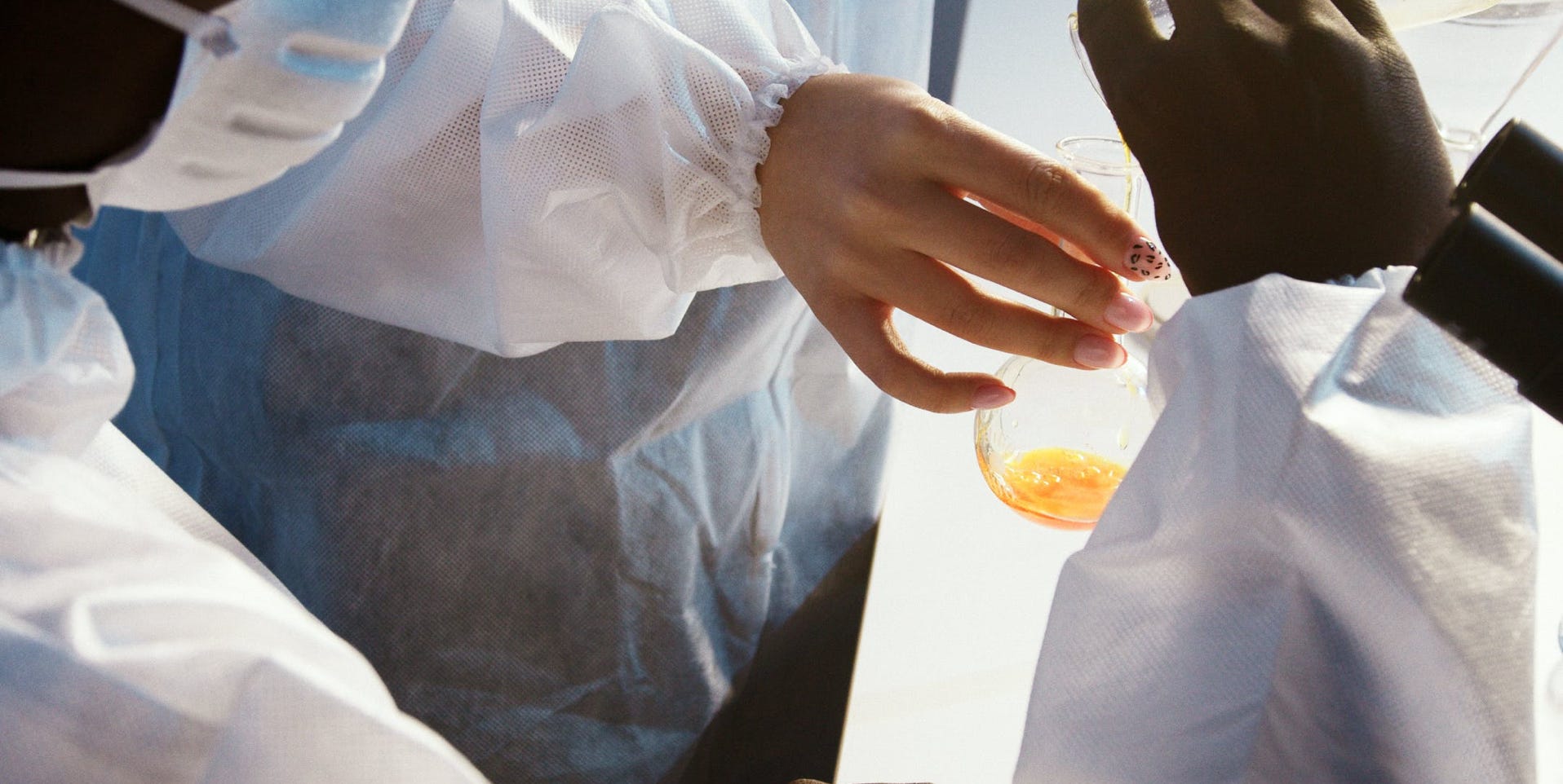 Two Persons Doing an Experiment